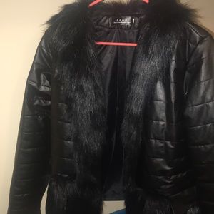 All black fur jacket never been worn before.